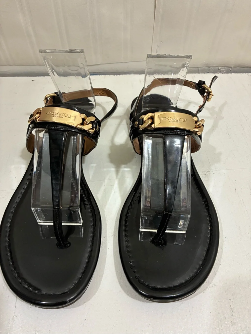 Coach Black Patent Leather T-Strap Sandals with Gold Plaque